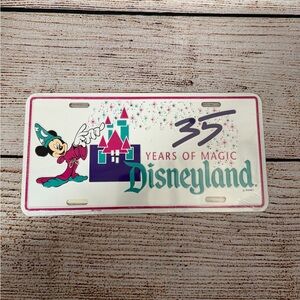 Disneyland 1990 Sorcerer Mickey 35 Years of Magic Metal License Plate - Sealed